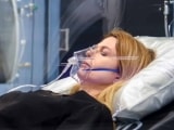 Female patient inside Sechrist hyperbaric chamber