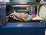 A Patient Laying Down in Hyperbaric Oxygen Chamber