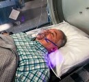 A Male Patient Smiling Inside Hyperbaric Oxygen Chamber