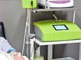 A patient is receiving a high dose ozone therapy treatment intravenously.