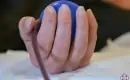 thumbs_a-long-covid-patient-holds-a-stress-ball-as-toxic-blood-is-removed-from-her-by-the-eboo-device-ama-regenerative-medicine-copy