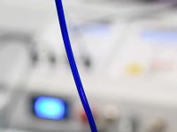 Close-up of the blue Methylene Blue IV line used in photodynamic therapy for Long COVID treatment.
