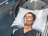 Man inside hyperbaric oxygen chamber