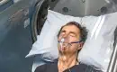 Man inside hyperbaric oxygen chamber