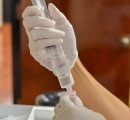 drawing-up-stem-cells-into-syringe