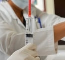 nurse-holding-syringe-of-mesenchymal-stem-cells