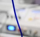 Methylene Blue IV line with Red Light Therapy device in background